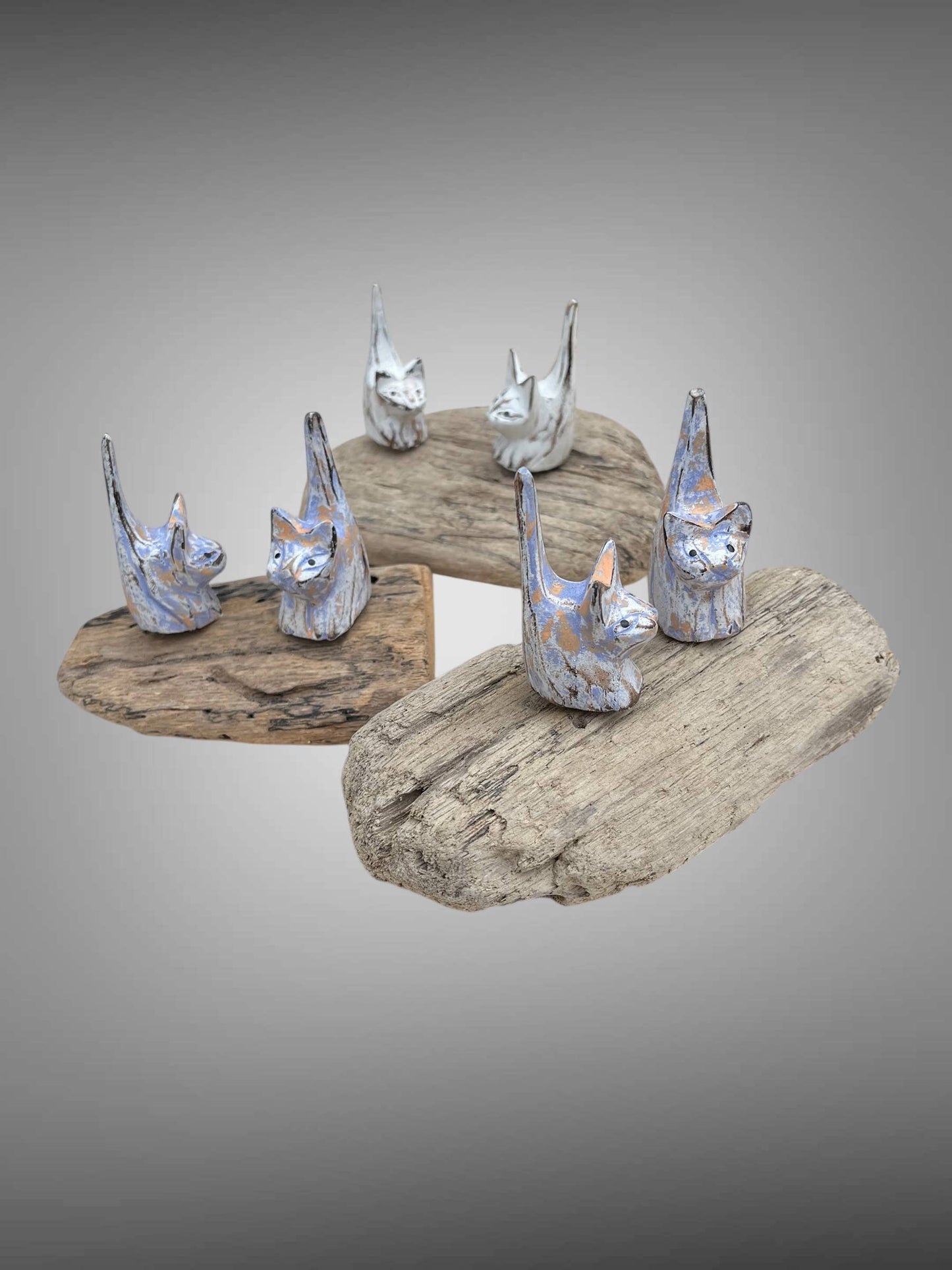 Cats - double carved and painted on a wood stand