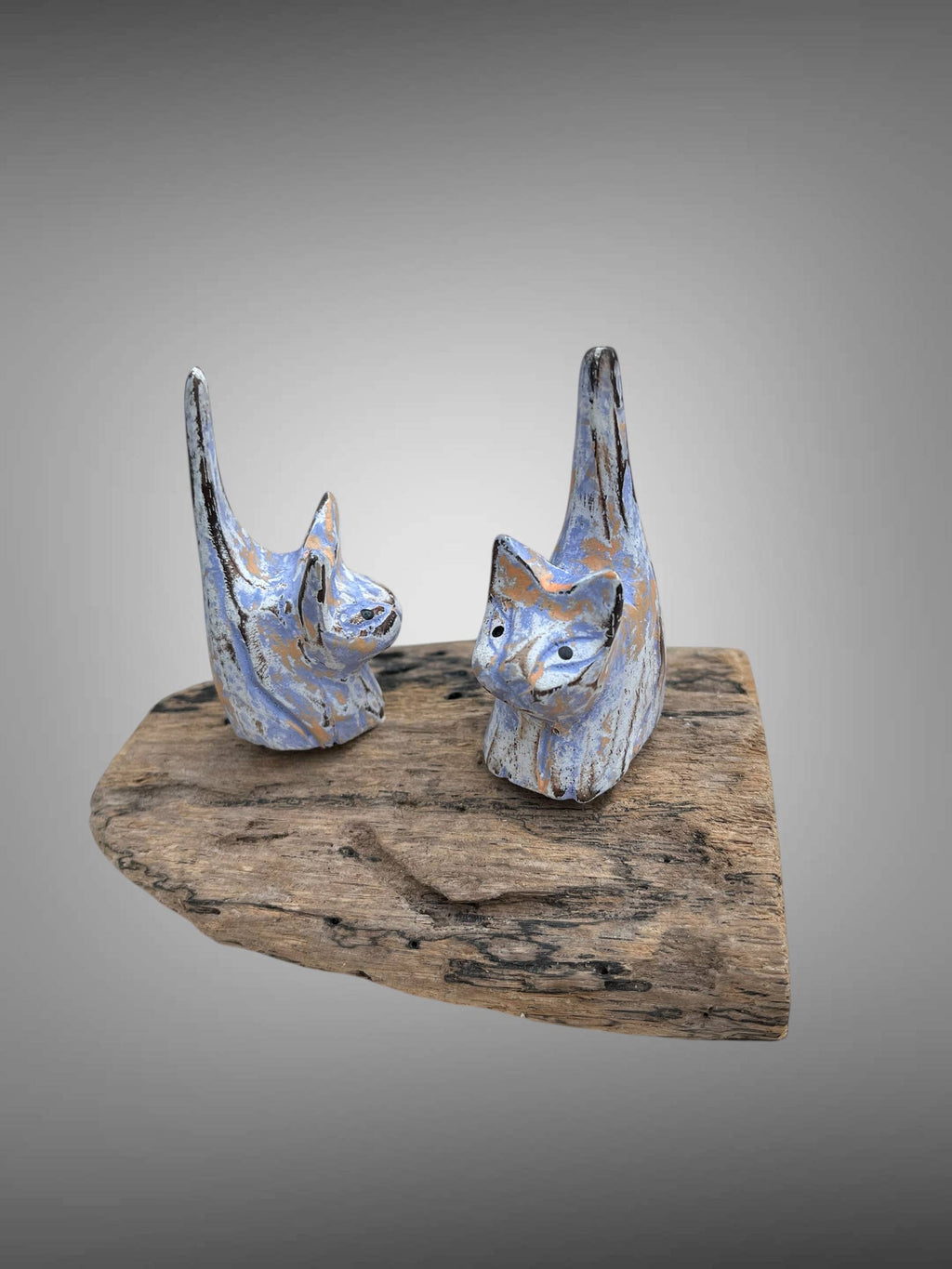 Cats - double carved and painted on a wood stand