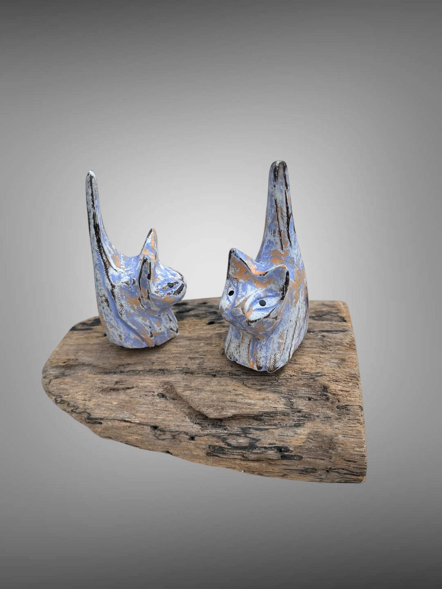 Cats - double carved and painted on a wood stand